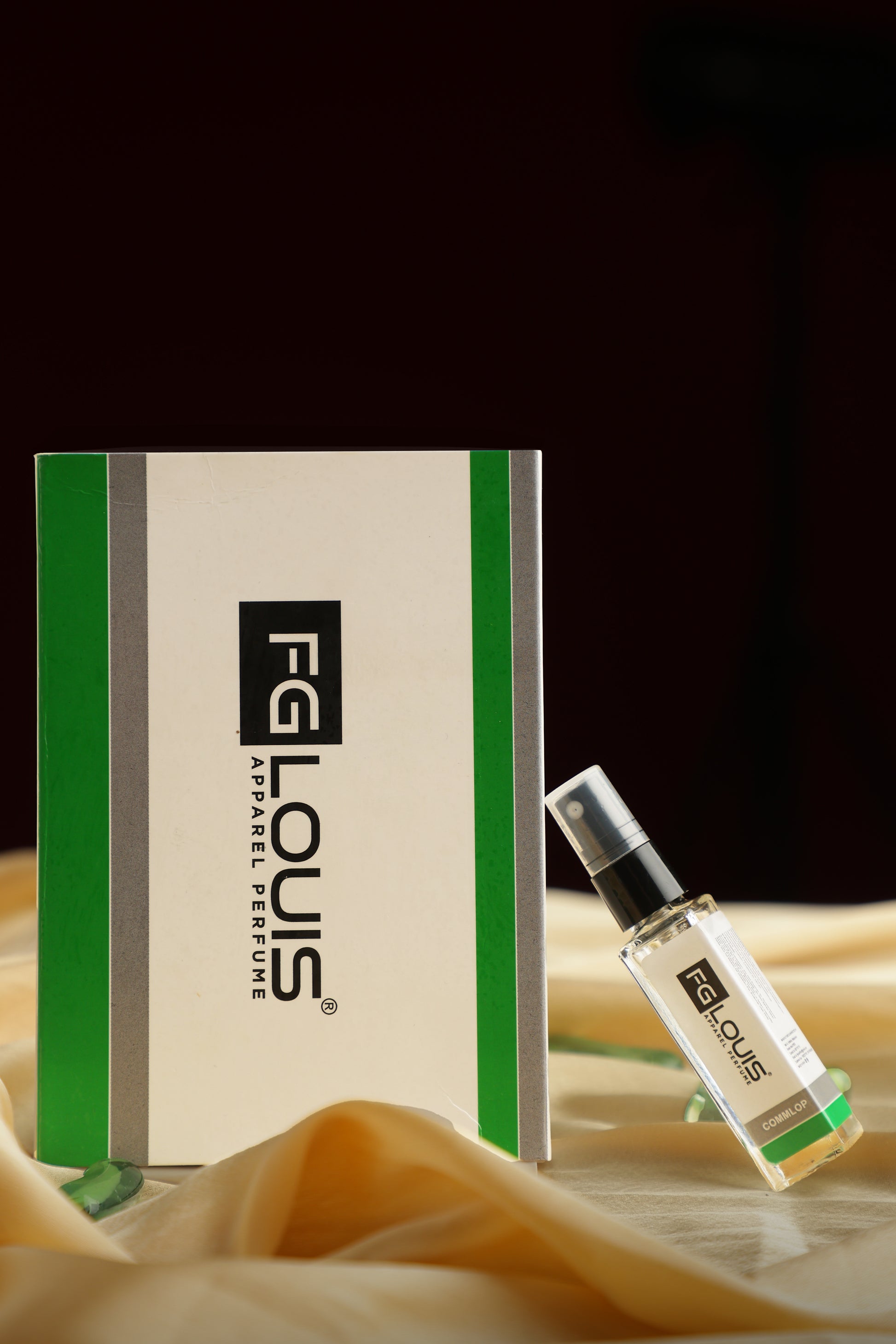 FG LOUIS free sample perfume bottle and packaging on a dark background